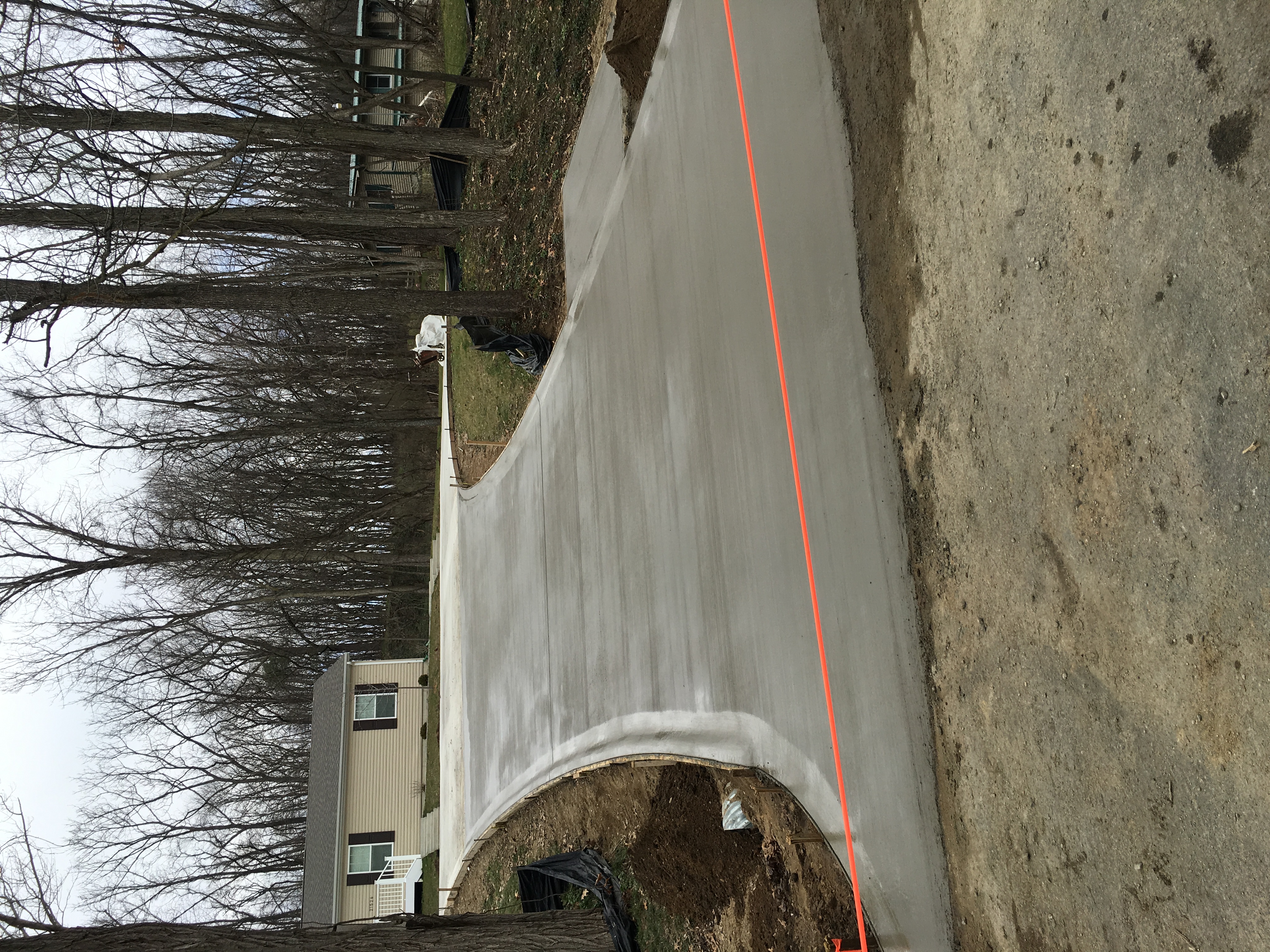 Completed residential concrete driveway at Klinger Lake in Sturgis Michigan