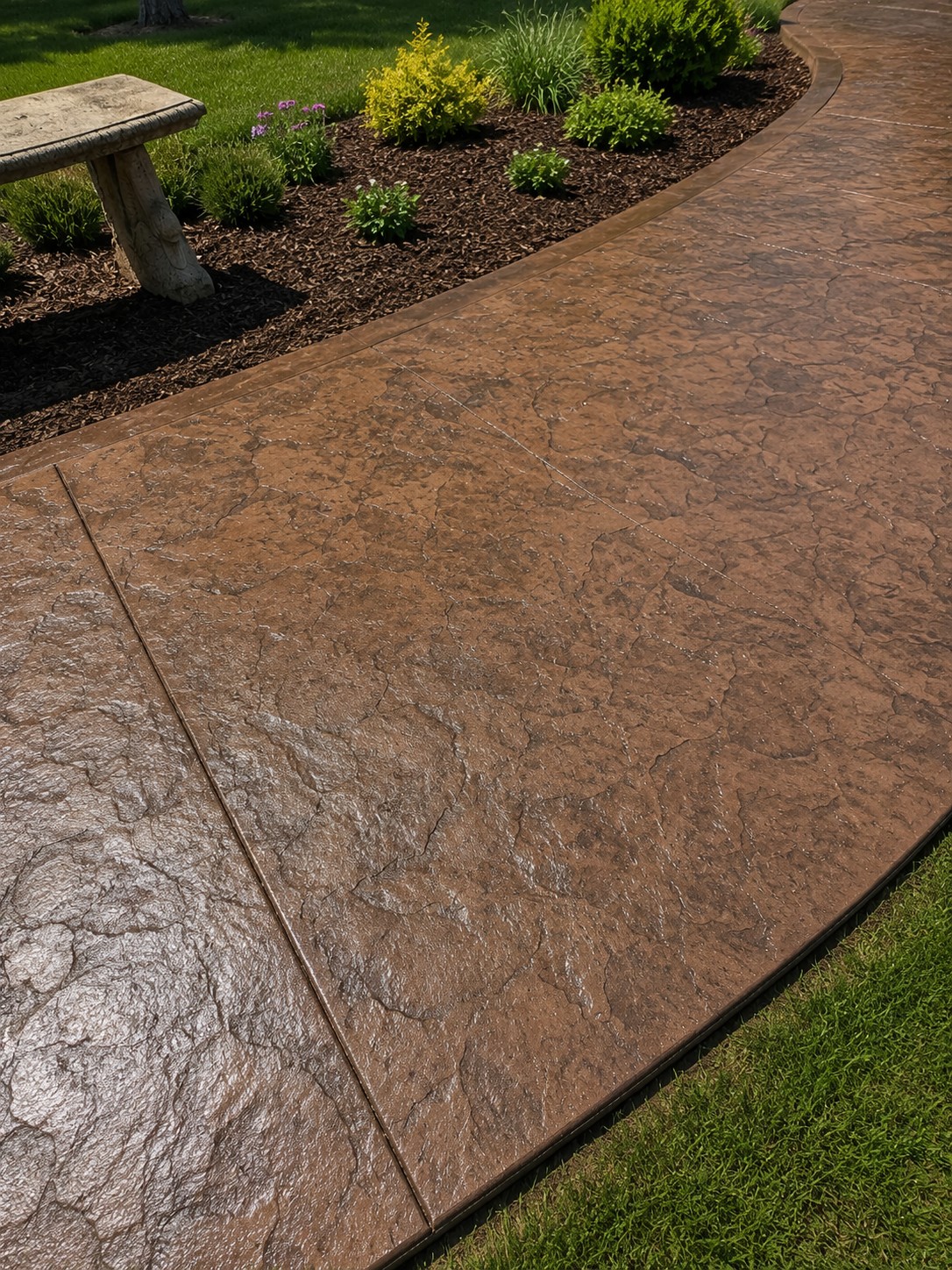 Close-up of the decorative stamped concrete pattern on a patio in Three Rivers, Michigan