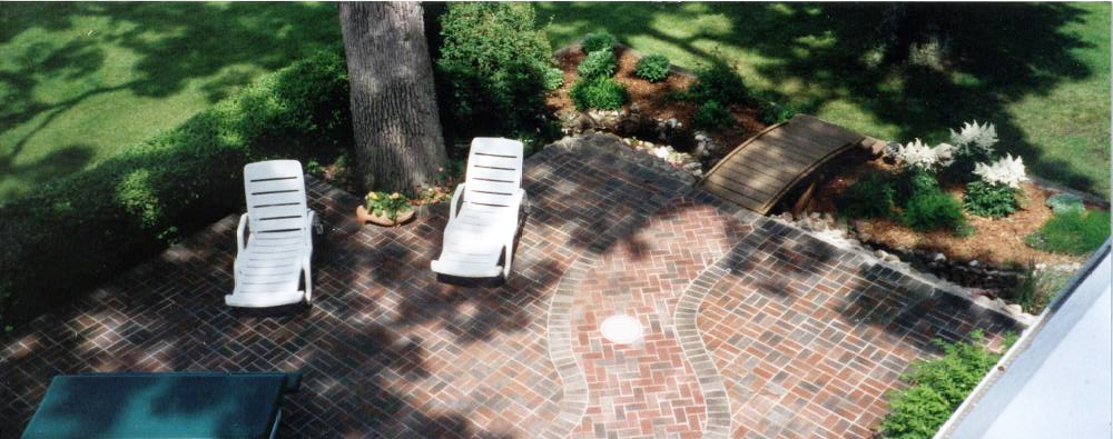 concrete contractor installation of paving brick patio with walkway